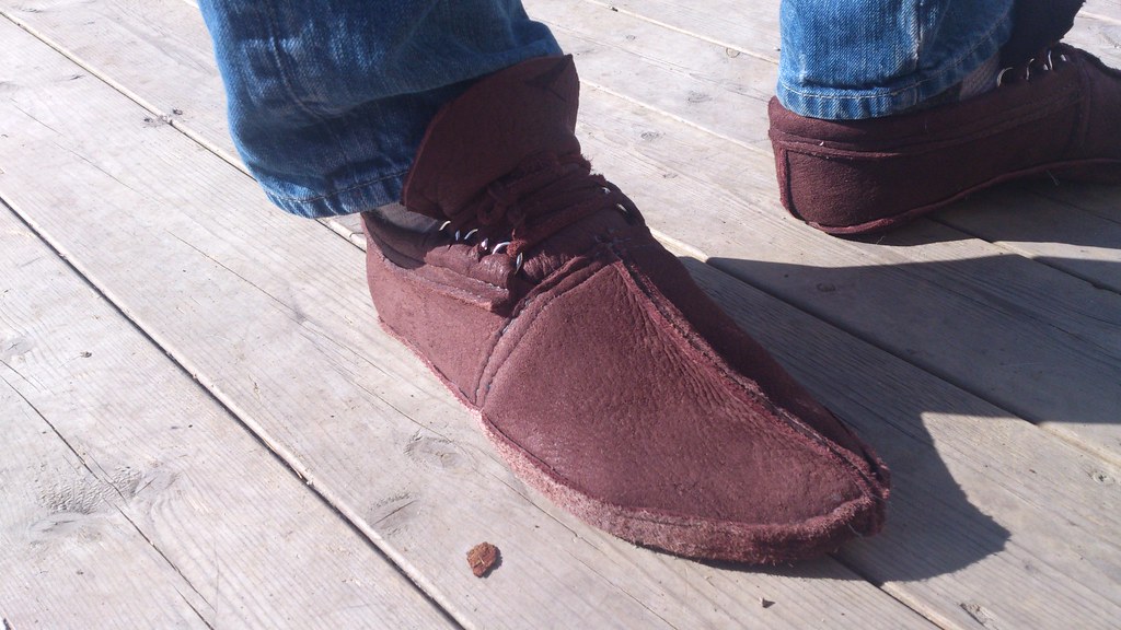 Men's shoes in soft tan leather, close up