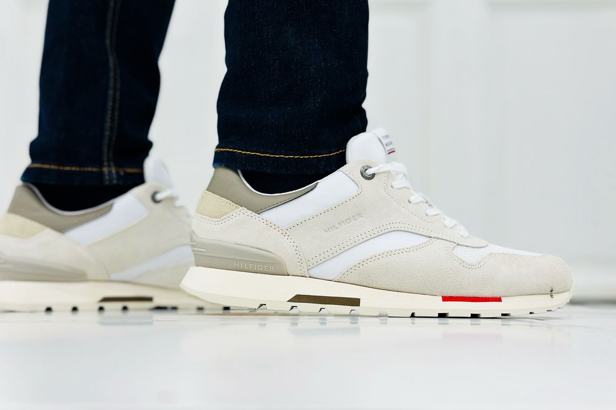 White trainers worn on feet during a city walk