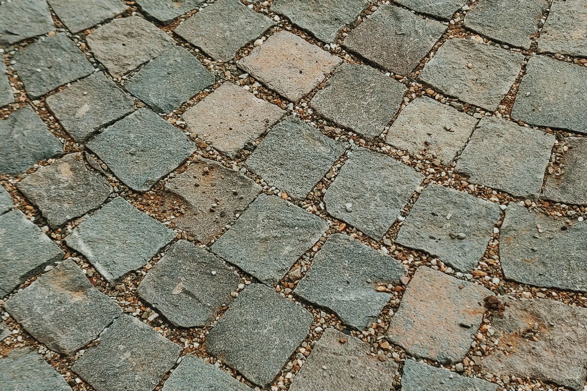 Classic cobblestone pavement texture in daylight